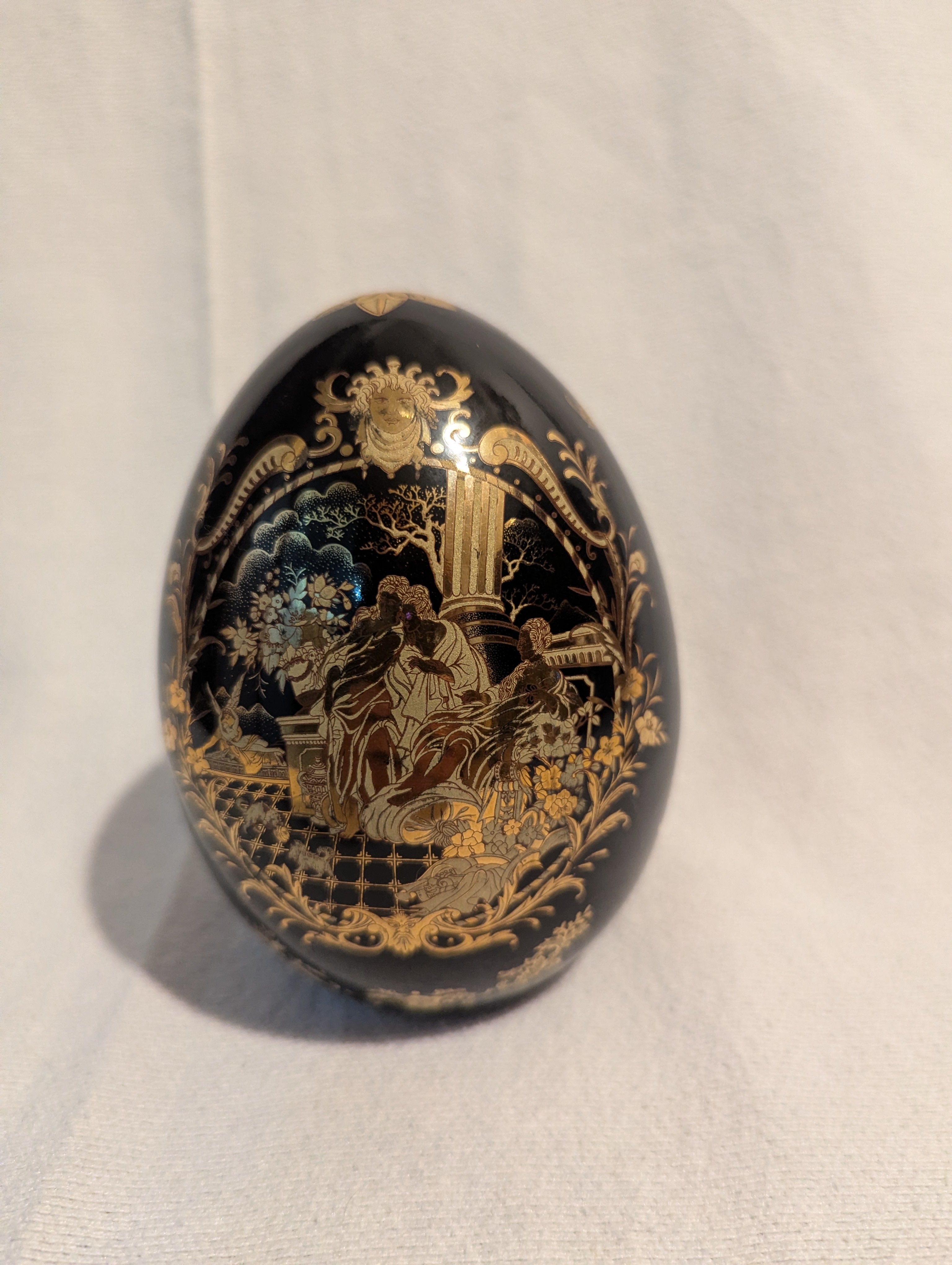 Black Satsuma Porcelain Egg figurine with Asian scenery