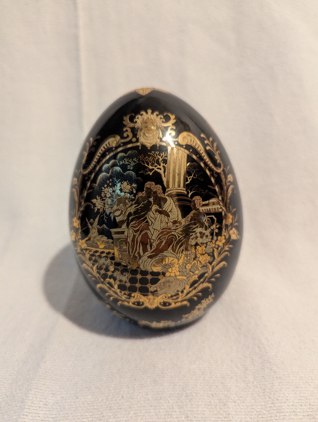 Black Satsuma Porcelain Egg figurine with Asian scenery