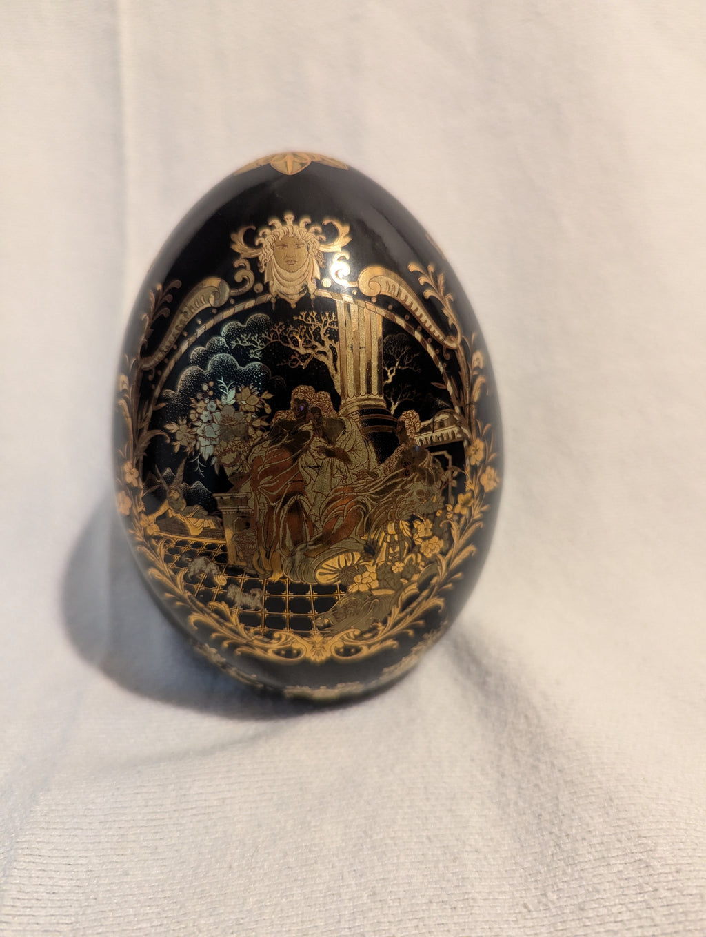 Black Satsuma Porcelain Egg figurine with Asian scenery