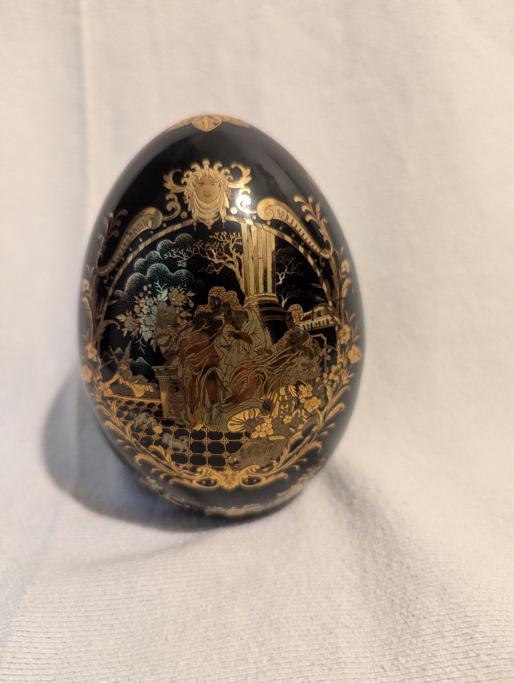 Black Satsuma Porcelain Egg figurine with Asian scenery